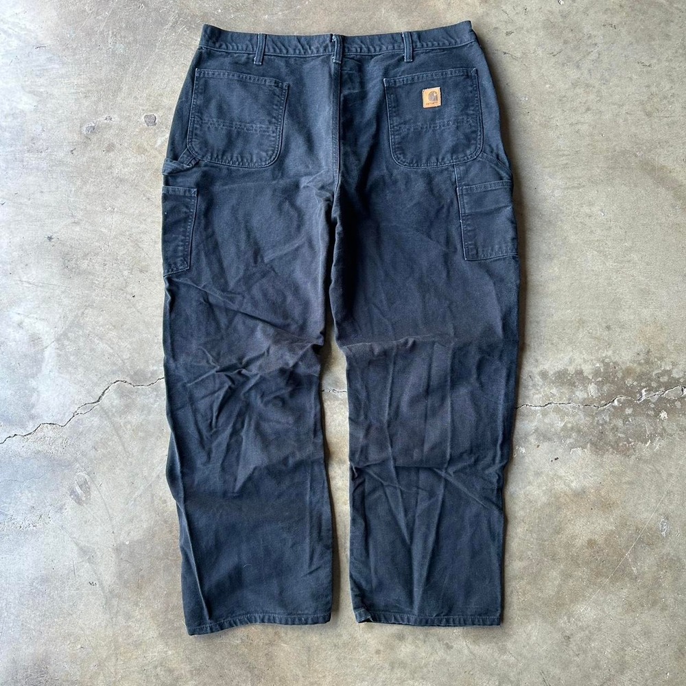 Faded black carhartt carpenter pants